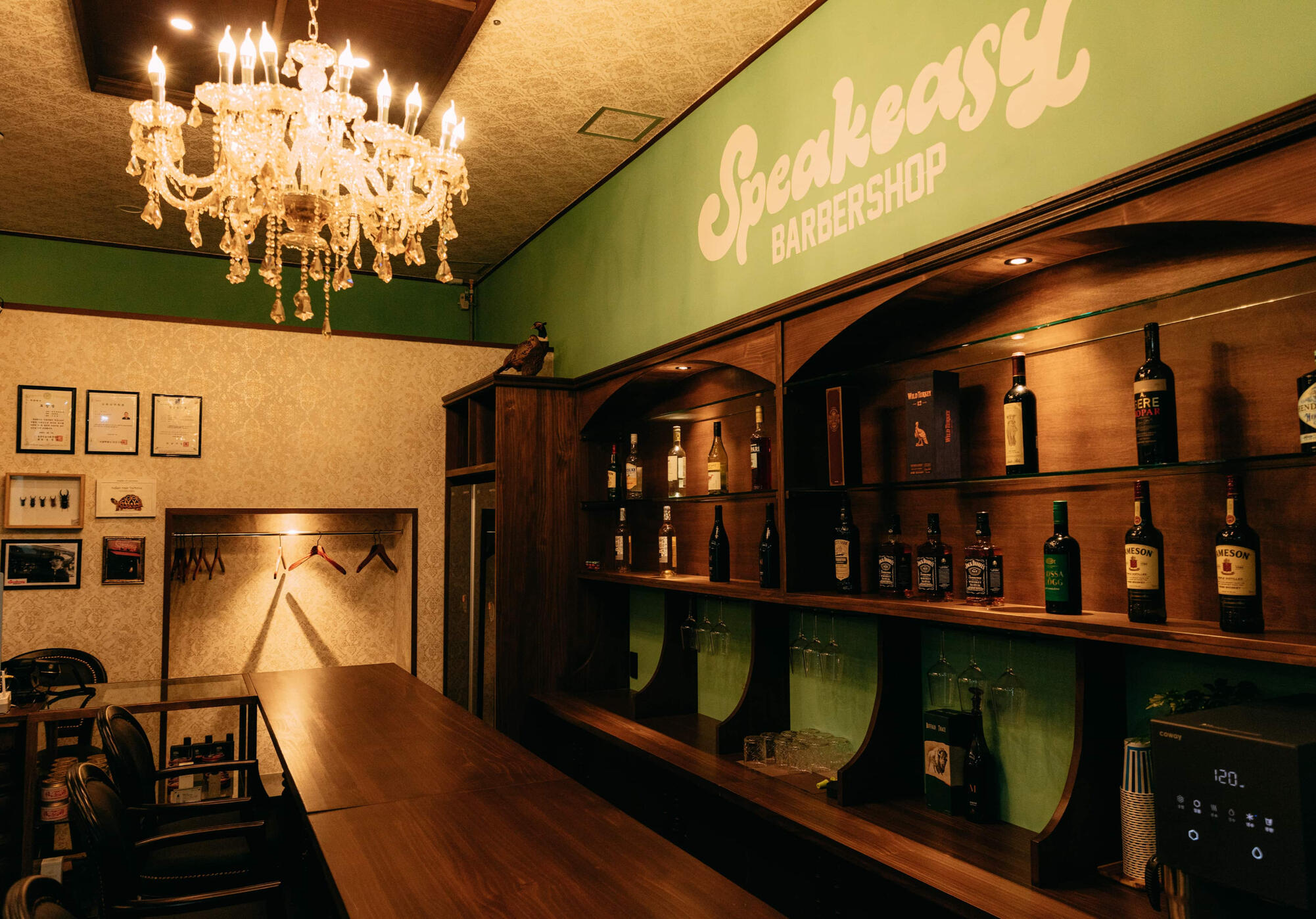 Speakeasy Barbershop Gangnam interior featuring vintage bar lounge and whiskey collection
